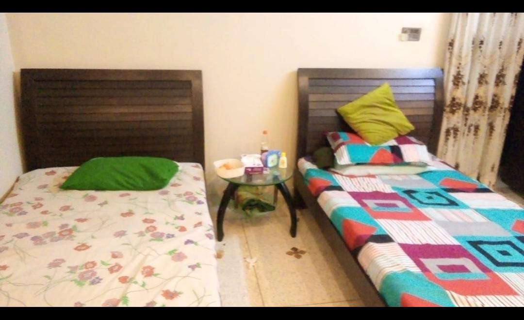 Two Seater Room at Rs Lucky Girls & Women Hostel
